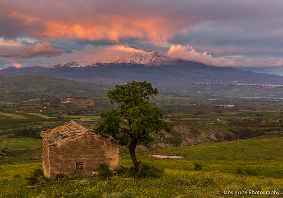 Lonely house in Sicilian landscape with mount Etna